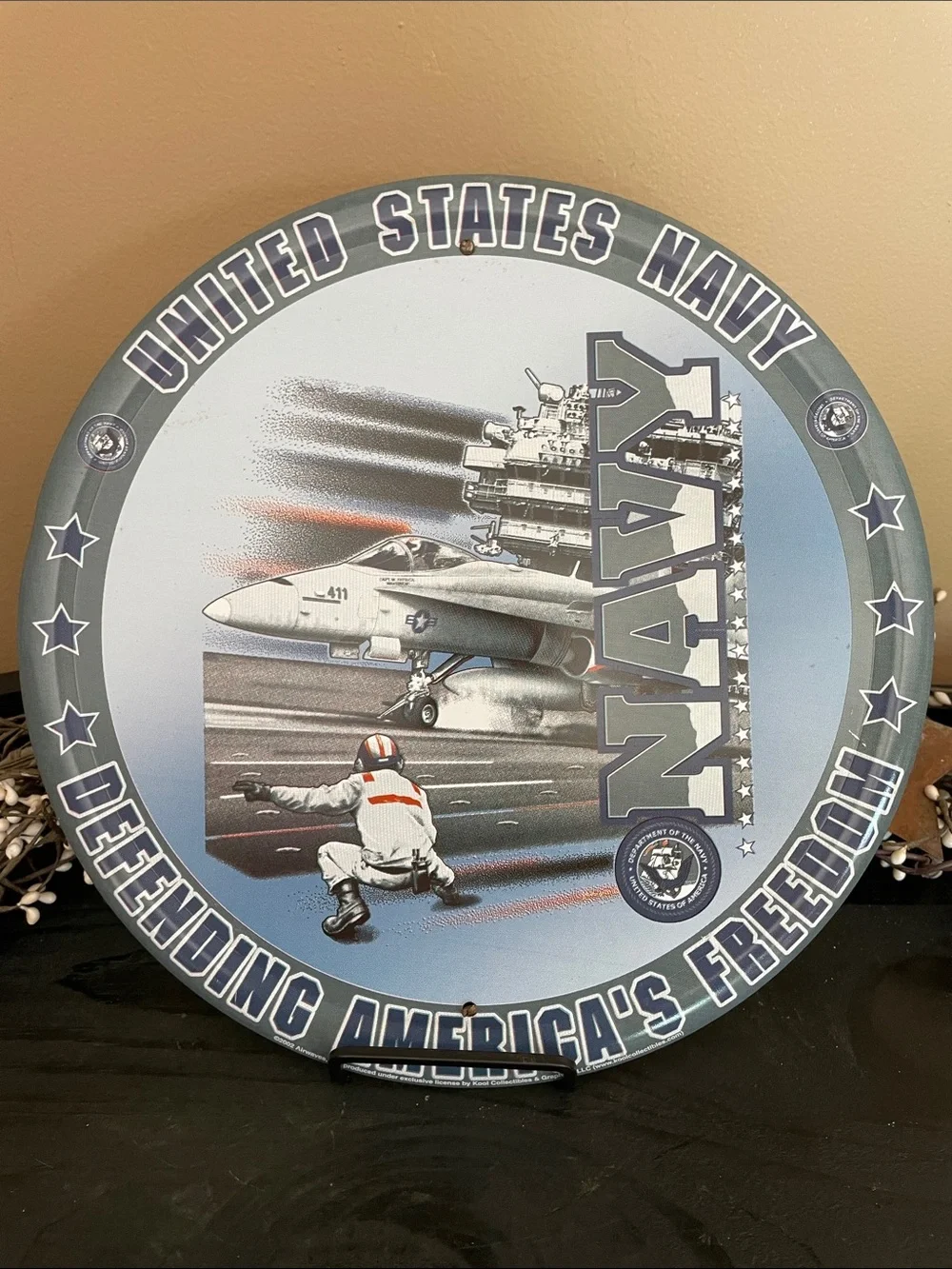 Share your pride with this United States Navy Round Metal Sign - 12”